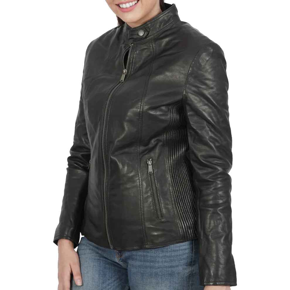 Woman wearing a black leather jacket with zippered pockets and blue jeans on white background