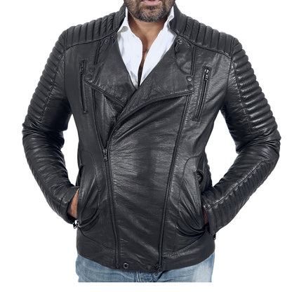 A man wearing a grey quilted leather jacket.
