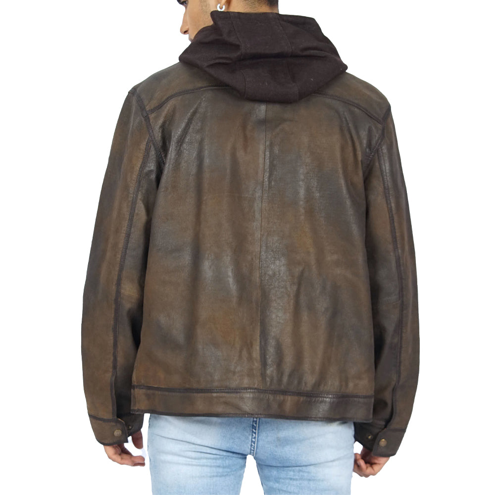 The vintage dark brown leather jacket worn by a man, as seen from the back.
