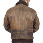 The back view of a man donning a bomber jacket in brown leather