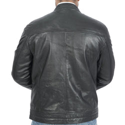 A man wearing a black leather jacket seen from behind.