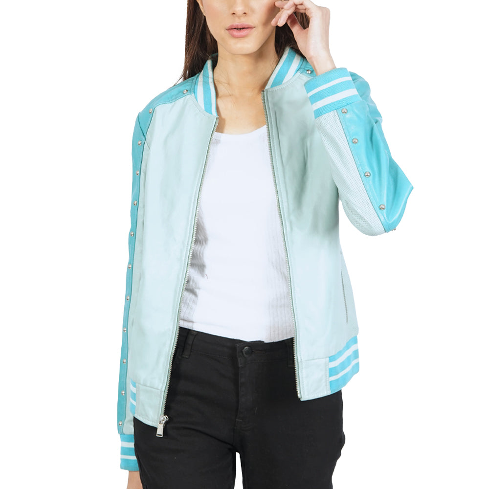 A woman wearing a turquoise bomber jacket.