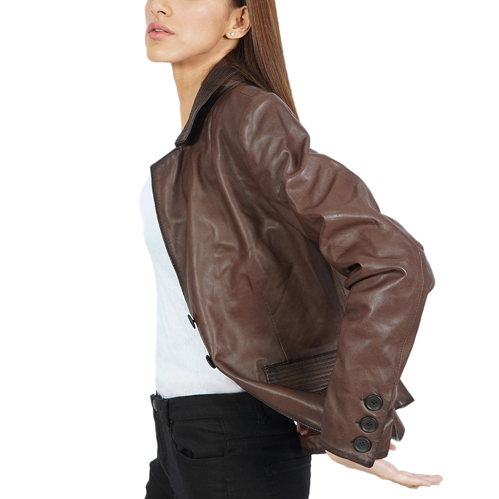 A women wearing a brown leather jacket.