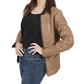 A woman rocking a swag brown leather jacket.