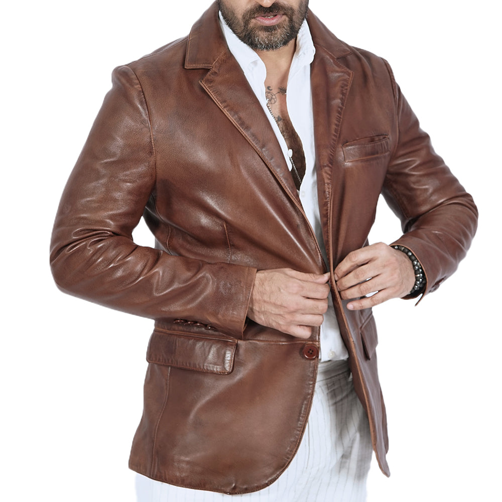 A man wearing a brown leather jacket.