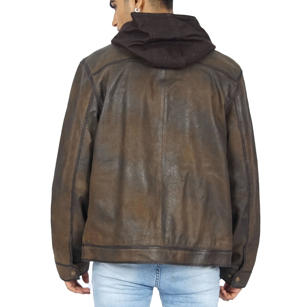 The vintage dark brown leather jacket worn by a man, as seen from the back.