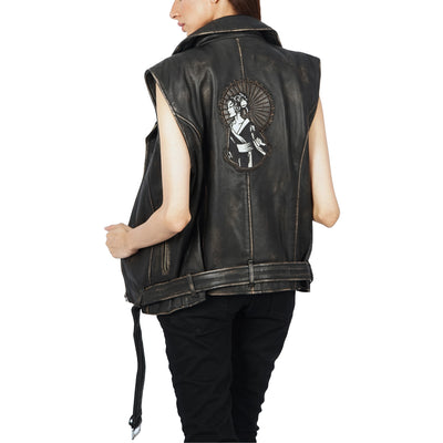 The back view of a woman wearing a Ash black leather vest Jacket.