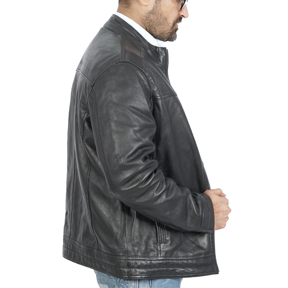 A man wearing a black leather jacket seen from behind.
